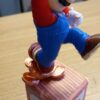 super mario  figure on gold cube with coins - Image 2