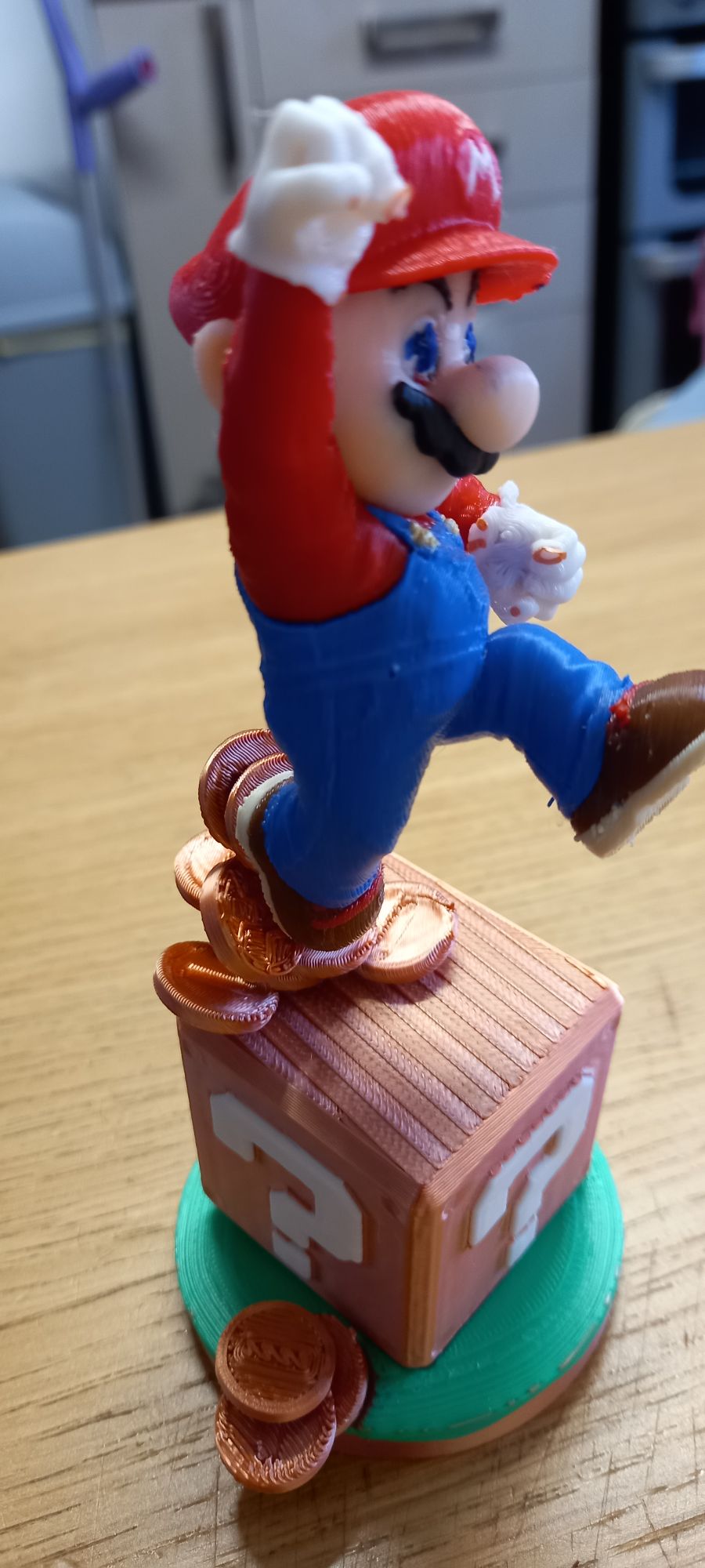 super mario  figure on gold cube with coins - Image 2
